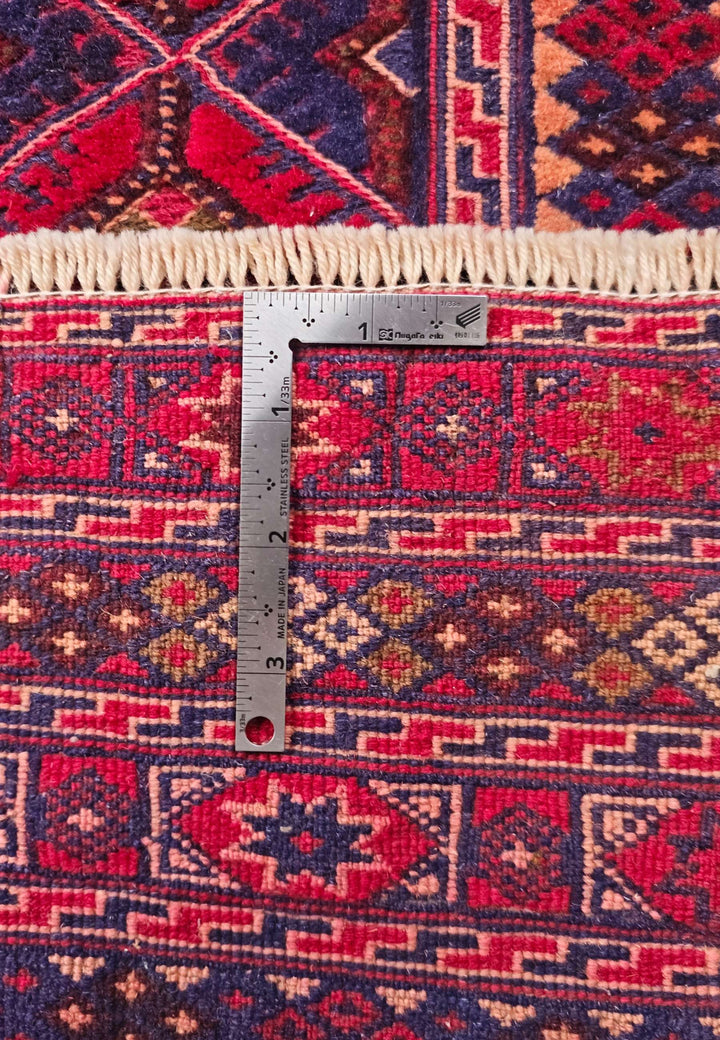 Corner of crimson navy diamond lattice kilim