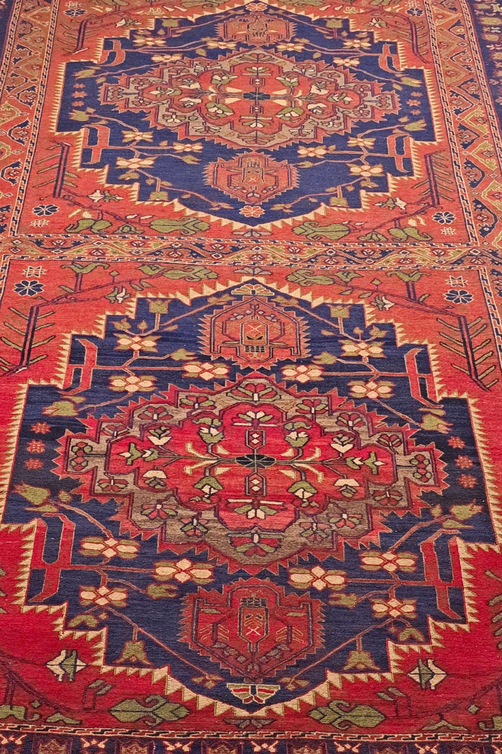 One-of-a-kind red and navy twin medallion Afghan kilim