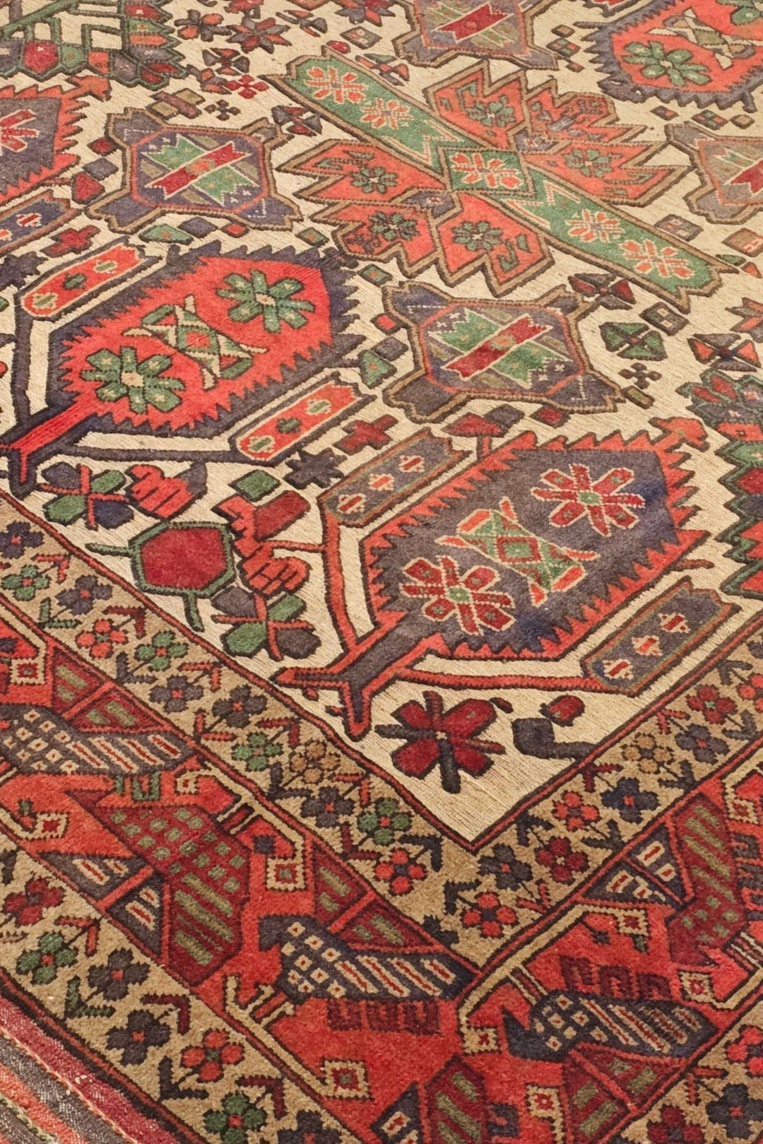 Laspanji pattern detail in cream and orange on Afghan kilim