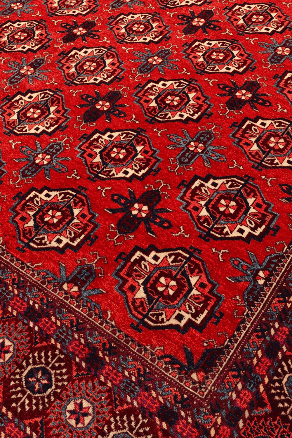 Turkmen gül motifs on brick red Afghan Sherwan wool rug