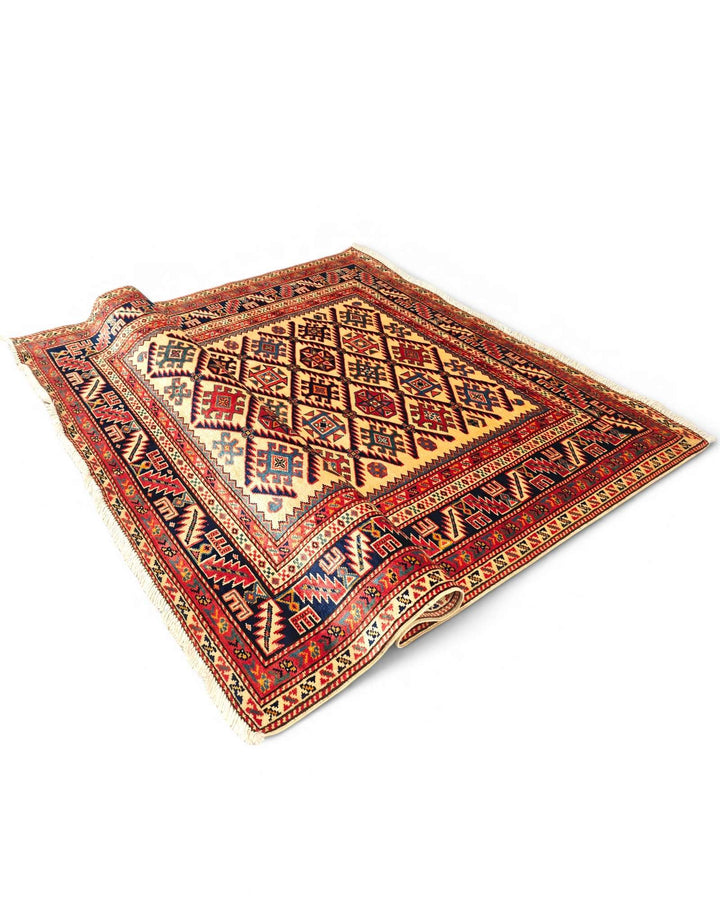 One-of-a-kind gold and red Shirvan lattice Afghan rug