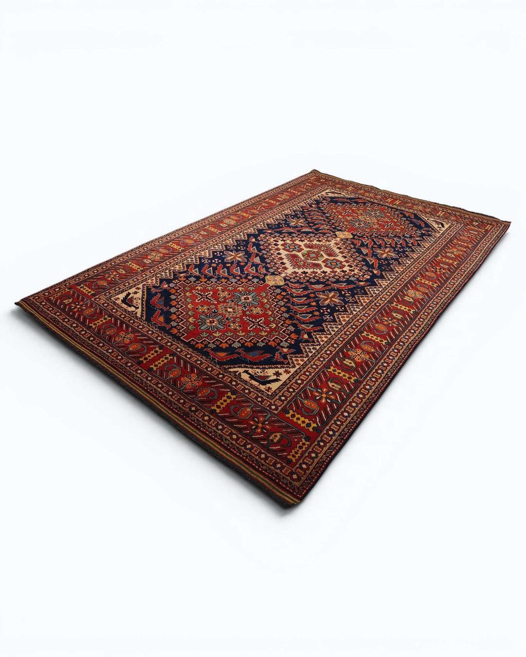 Hand-knotted indigo Afghan rug with Caucasian medallion