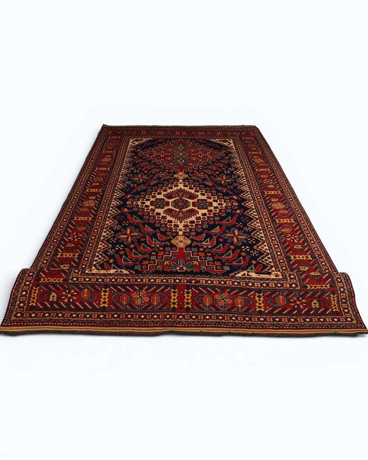 Corner of indigo Caucasian medallion Afghan hand-knotted rug