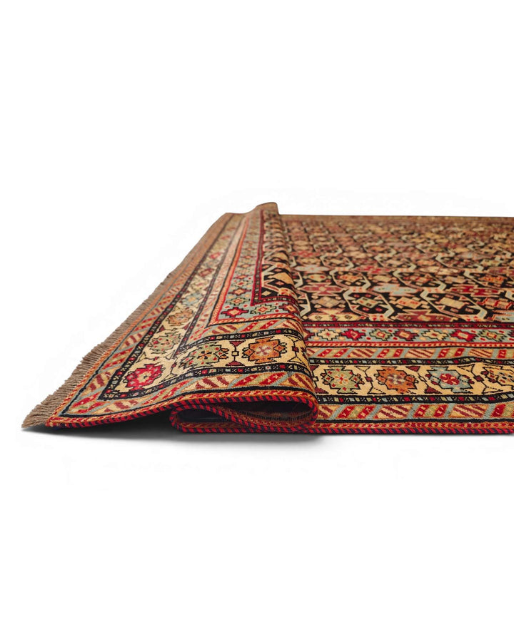 Hand-knotted red Afghan rug with Chi-Chi Caucasian border