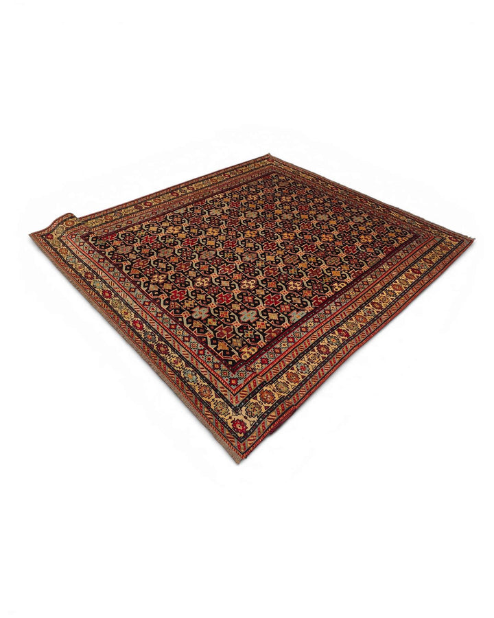 Fringe of red and indigo Chi-Chi Afghan Sherwan rug