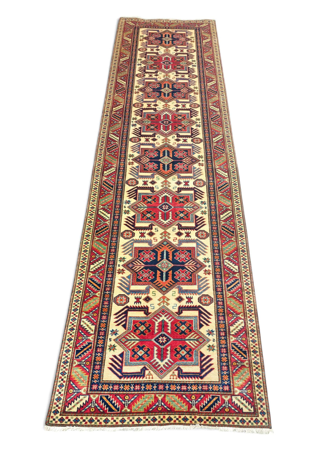 Border detail of ivory and red hand-knotted Afghan Sherwan runner