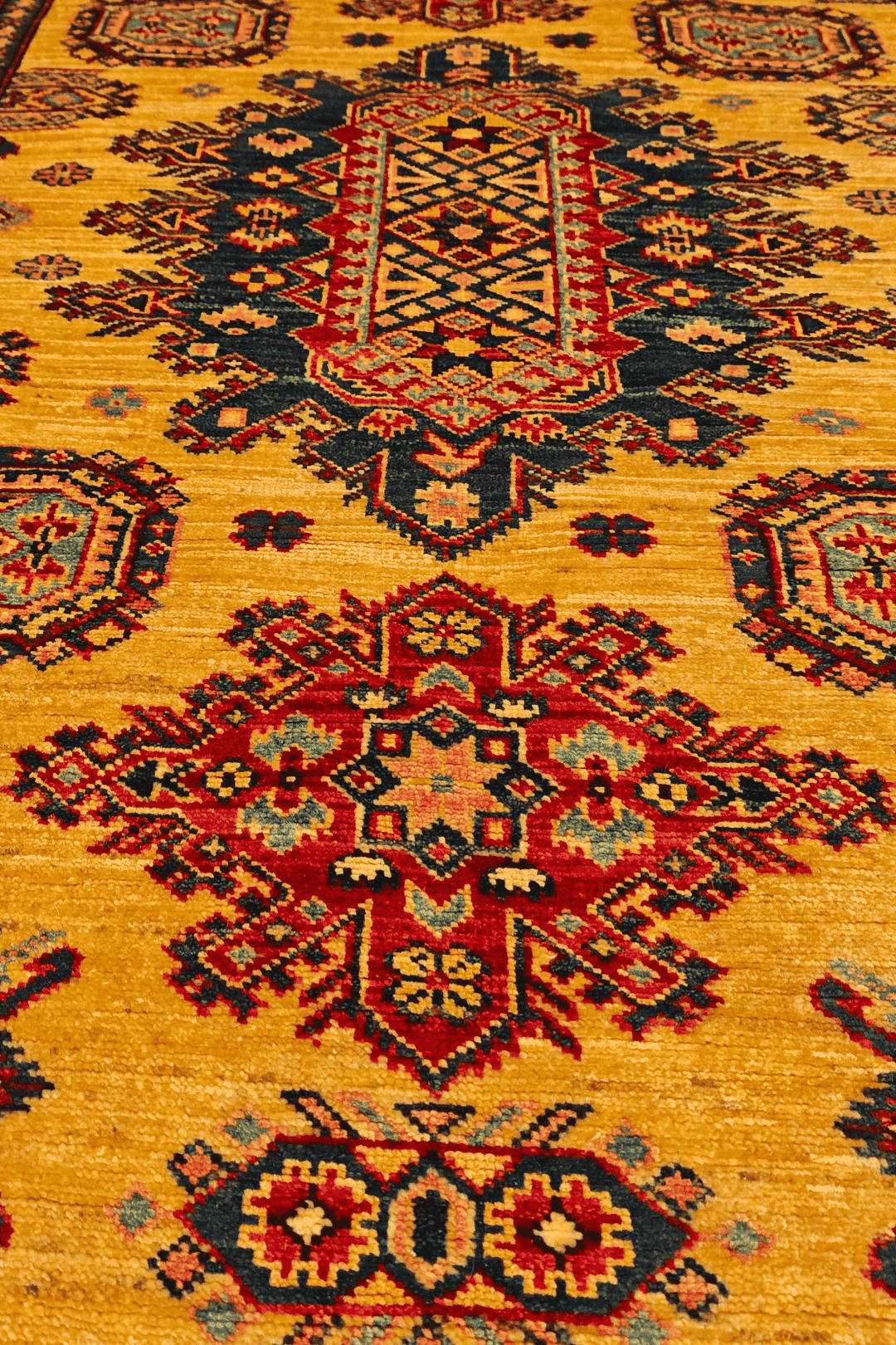 Hand-knotted wool pile of marigold tribal rug, 121×180cm