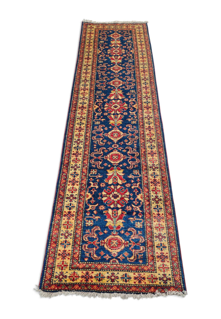 Border detail of navy and gold hand-knotted Afghan runner