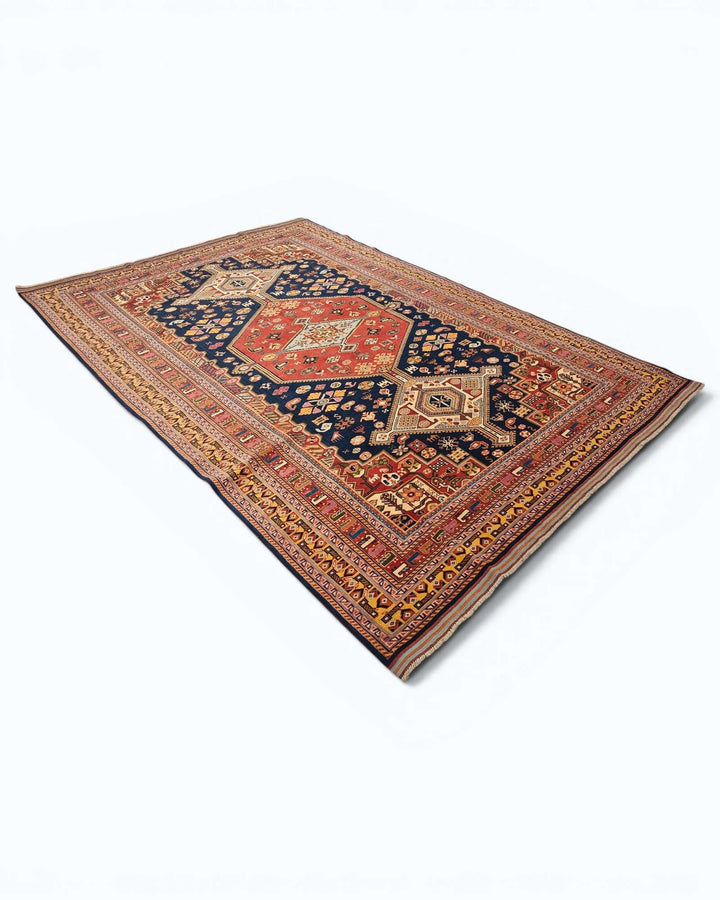 Khamseh tribal rug in navy and red, hand-knotted Afghan wool