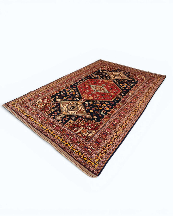 One-of-a-kind navy and red Khamseh tribal Afghan rug