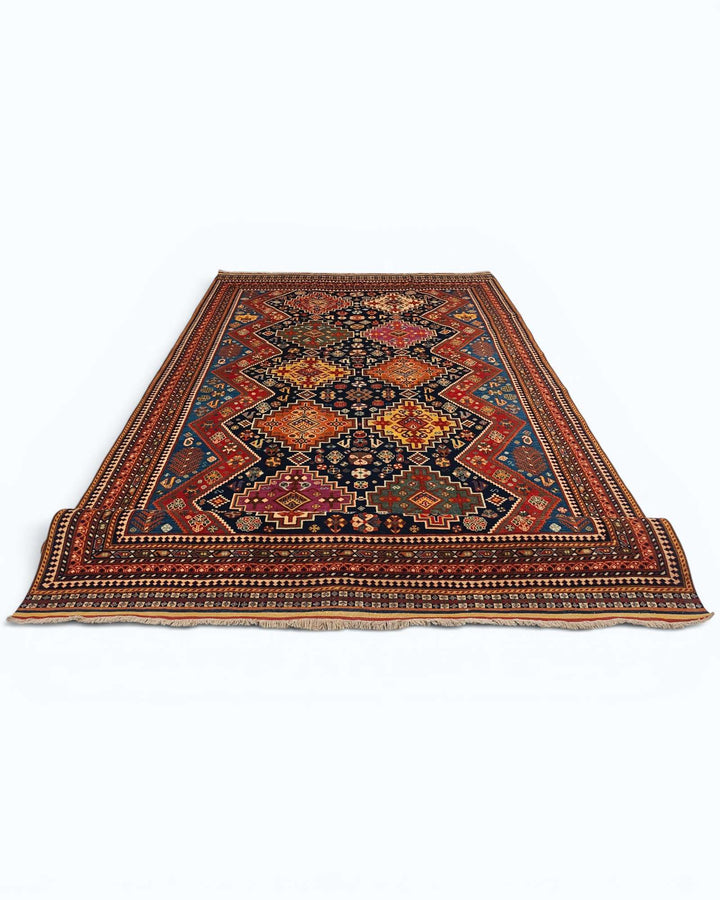 Hand-knotted navy Afghan rug with Kashkuli tribal motifs