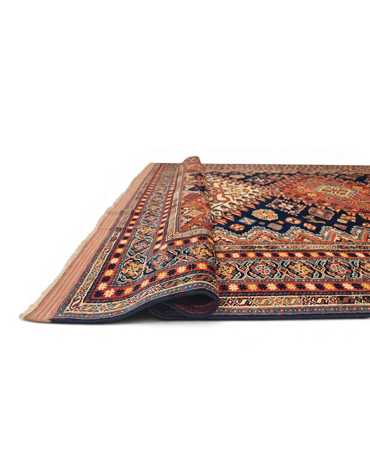 Fringe of navy and red Yalameh Afghan Sherwan rug