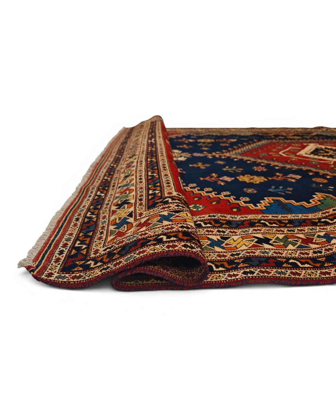 Corner of navy and red Afshar Afghan hand-knotted rug