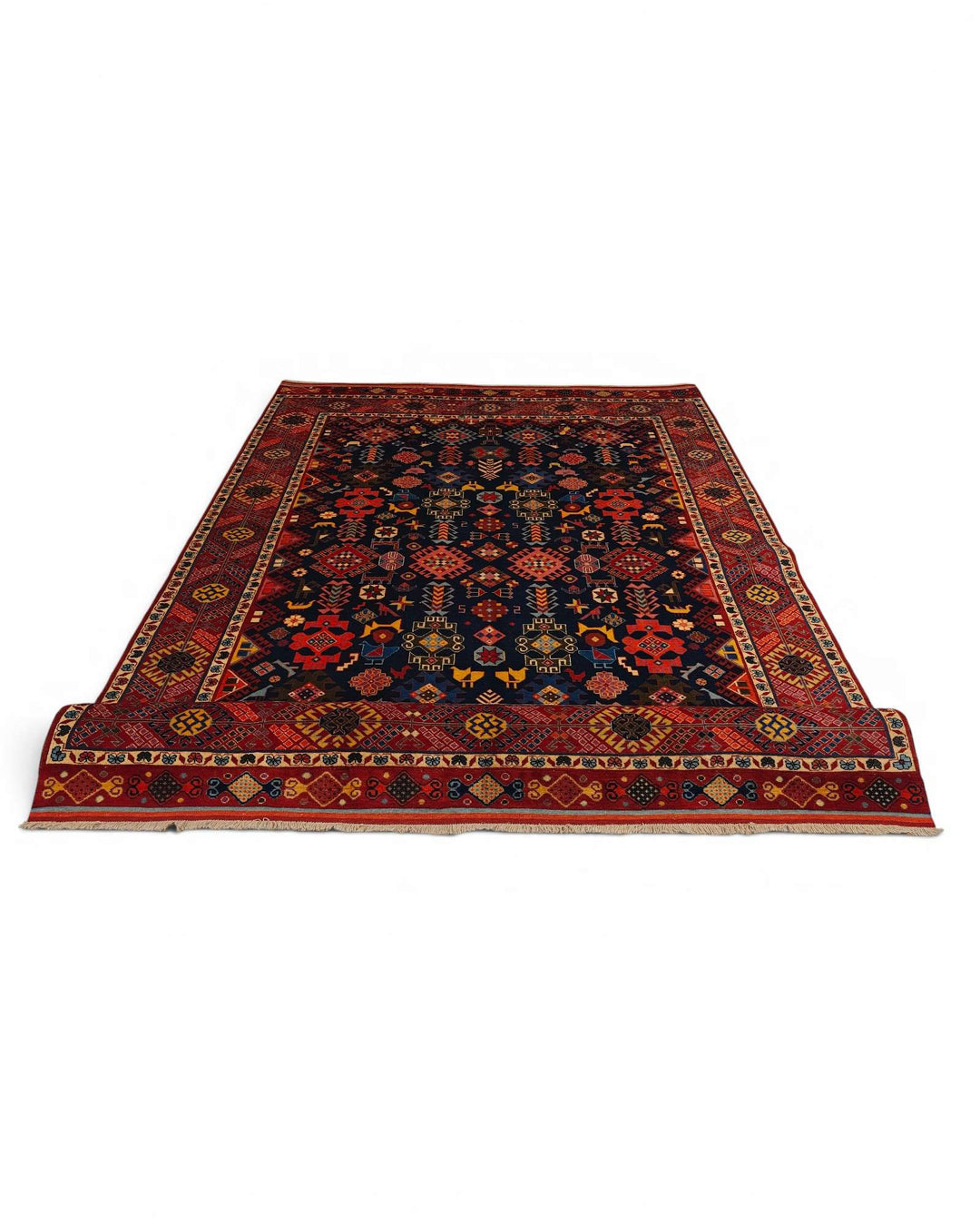 Corner of navy and red Shemakha Afghan hand-knotted rug