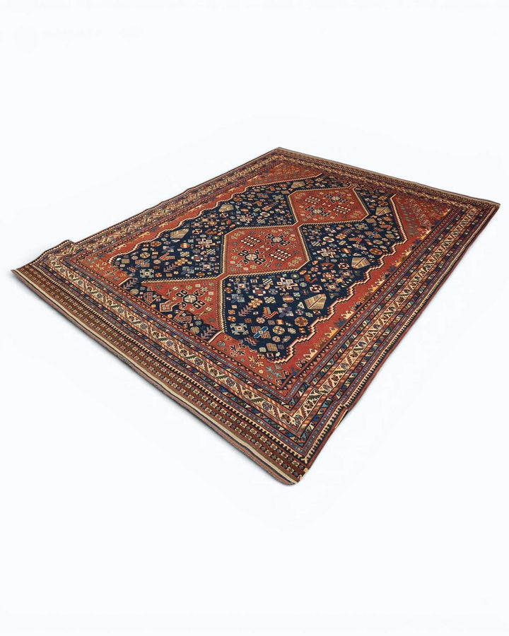 One-of-a-kind navy and red Qashqai tribal Afghan rug