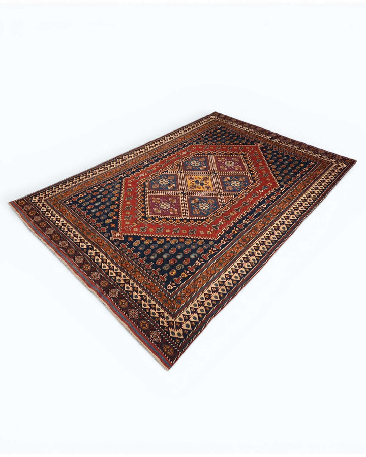 Hand-knotted wool pile of navy tribal medallion Afghan rug