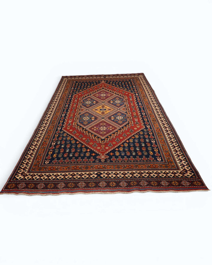 Tribal medallion rug in navy and red, hand-knotted Afghan wool