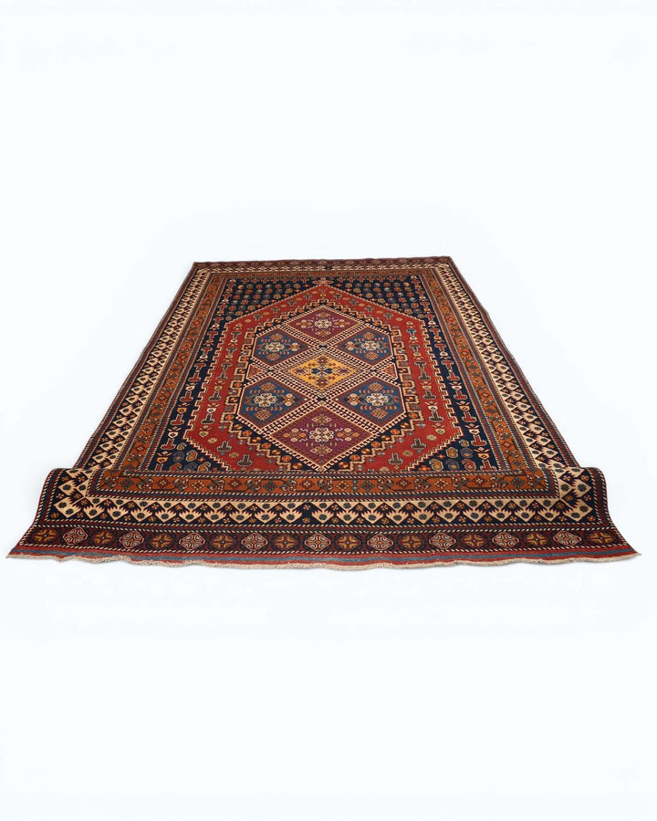 Hand-knotted navy Afghan rug with central tribal medallion