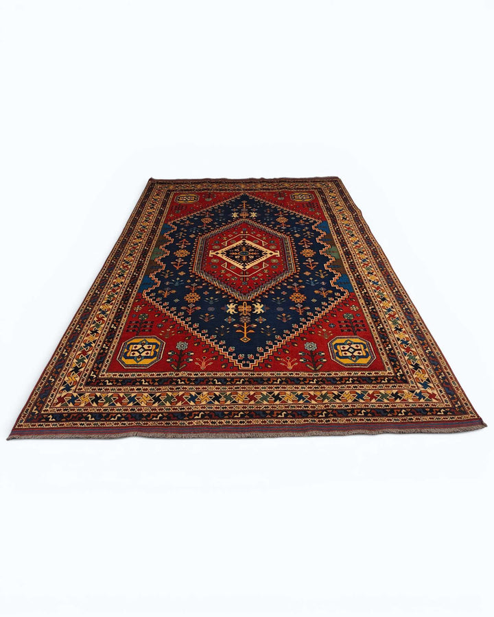 Hand-knotted wool pile of navy Shiraz Afghan Sherwan rug