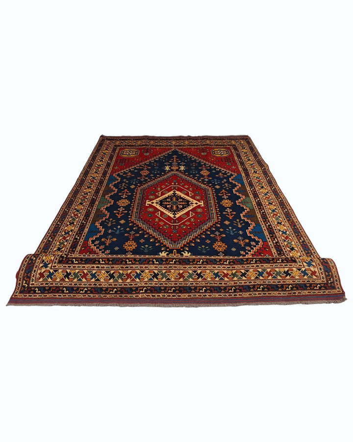 Hand-knotted navy Afghan rug with Shiraz central medallion