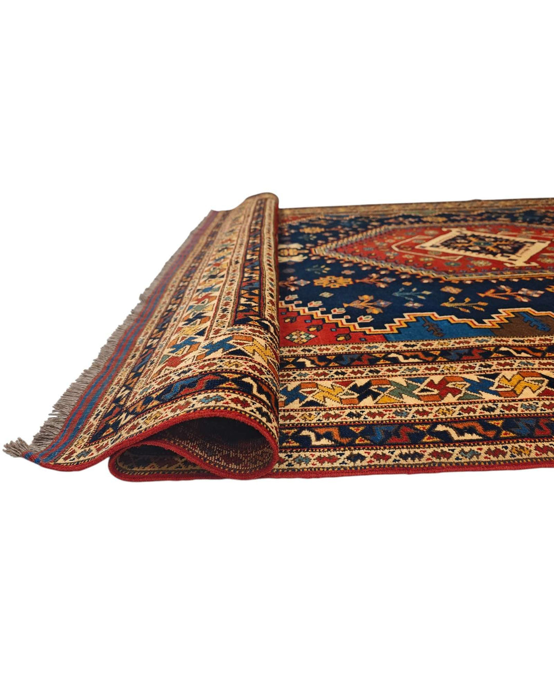Corner of navy and red Shiraz Afghan hand-knotted rug