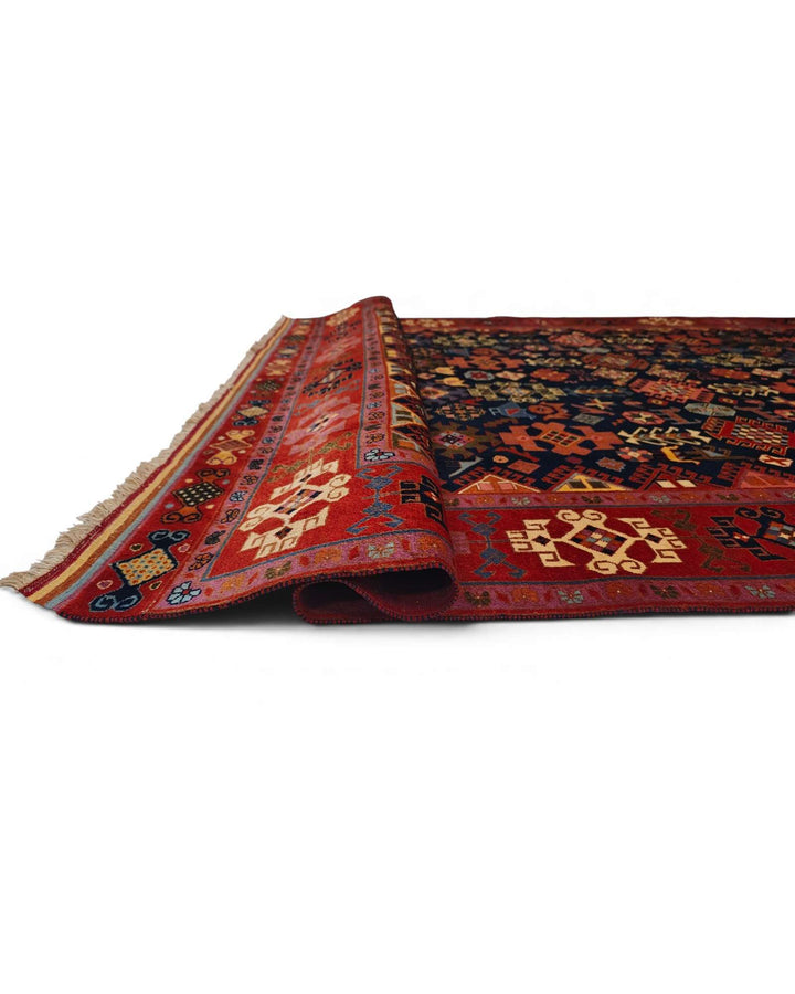 Hand-knotted navy Afghan rug with Afshan floral field