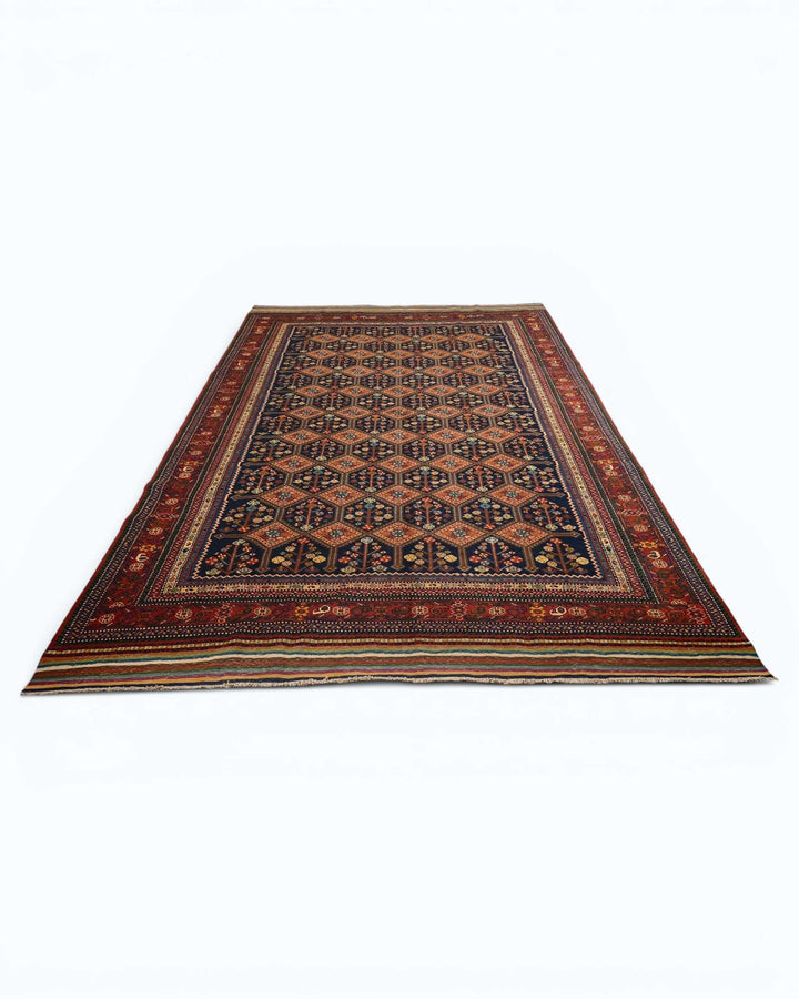 One-of-a-kind navy and red garden lattice Afghan rug