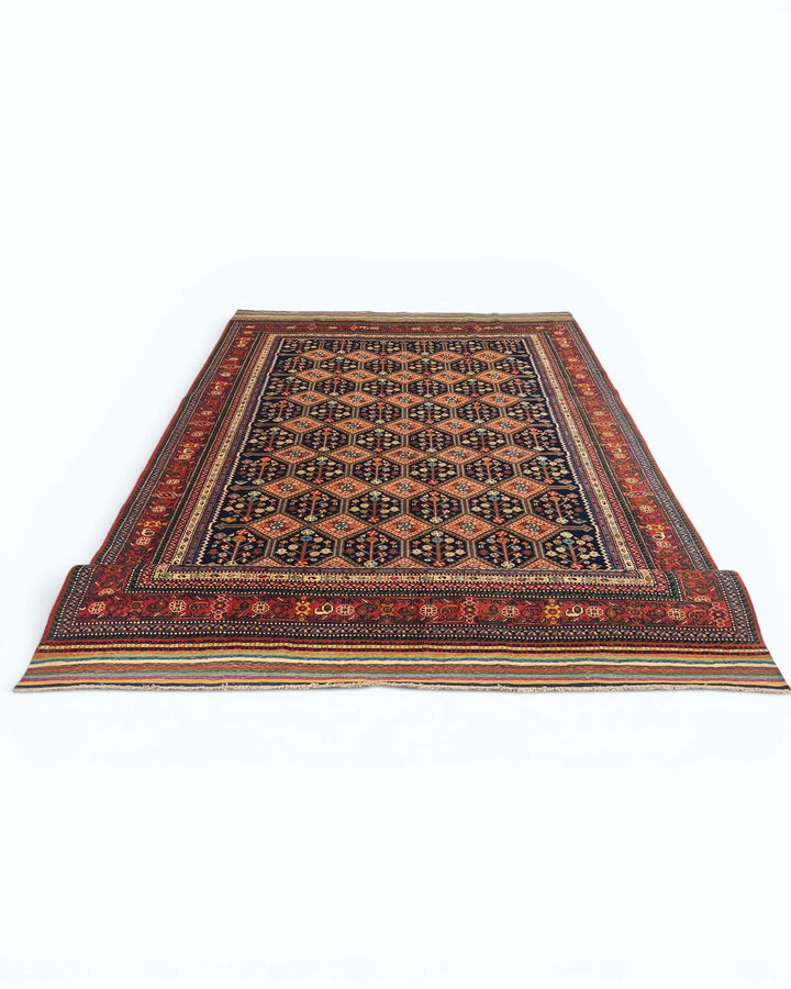 Corner of navy and red garden lattice Afghan hand-knotted rug