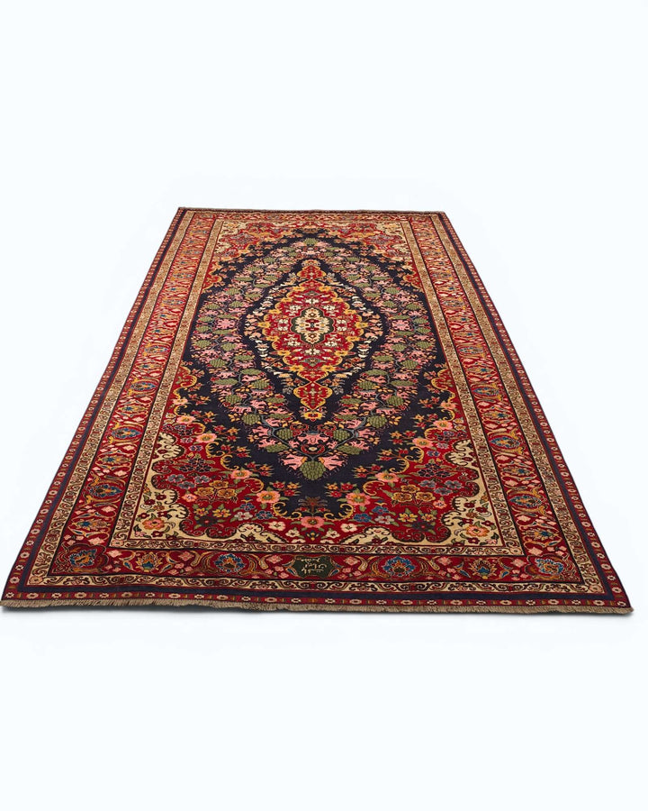 Hand-knotted wool pile of navy Kashan Afghan Sherwan rug