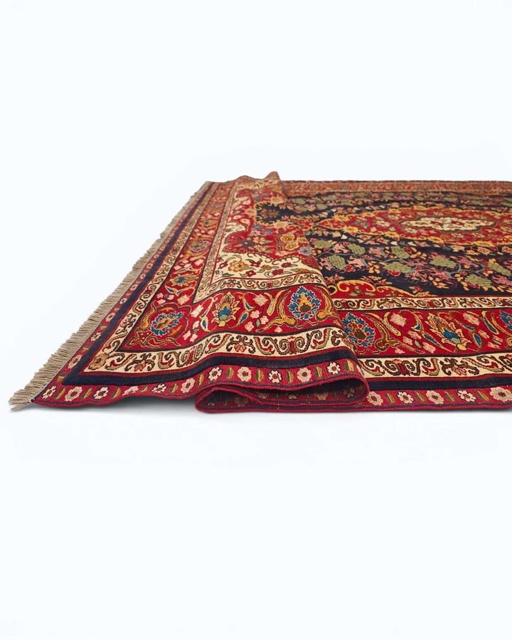 Hand-knotted navy Afghan rug with Kashan central medallion