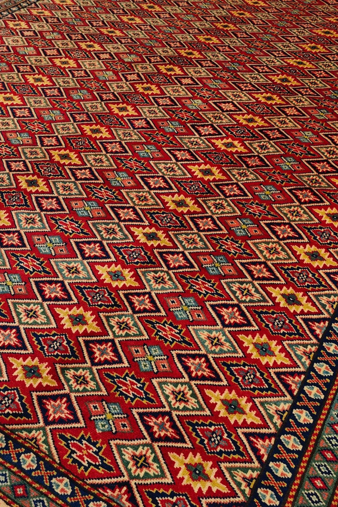 Hand-knotted wool pile of red lattice rug, 192×279cm