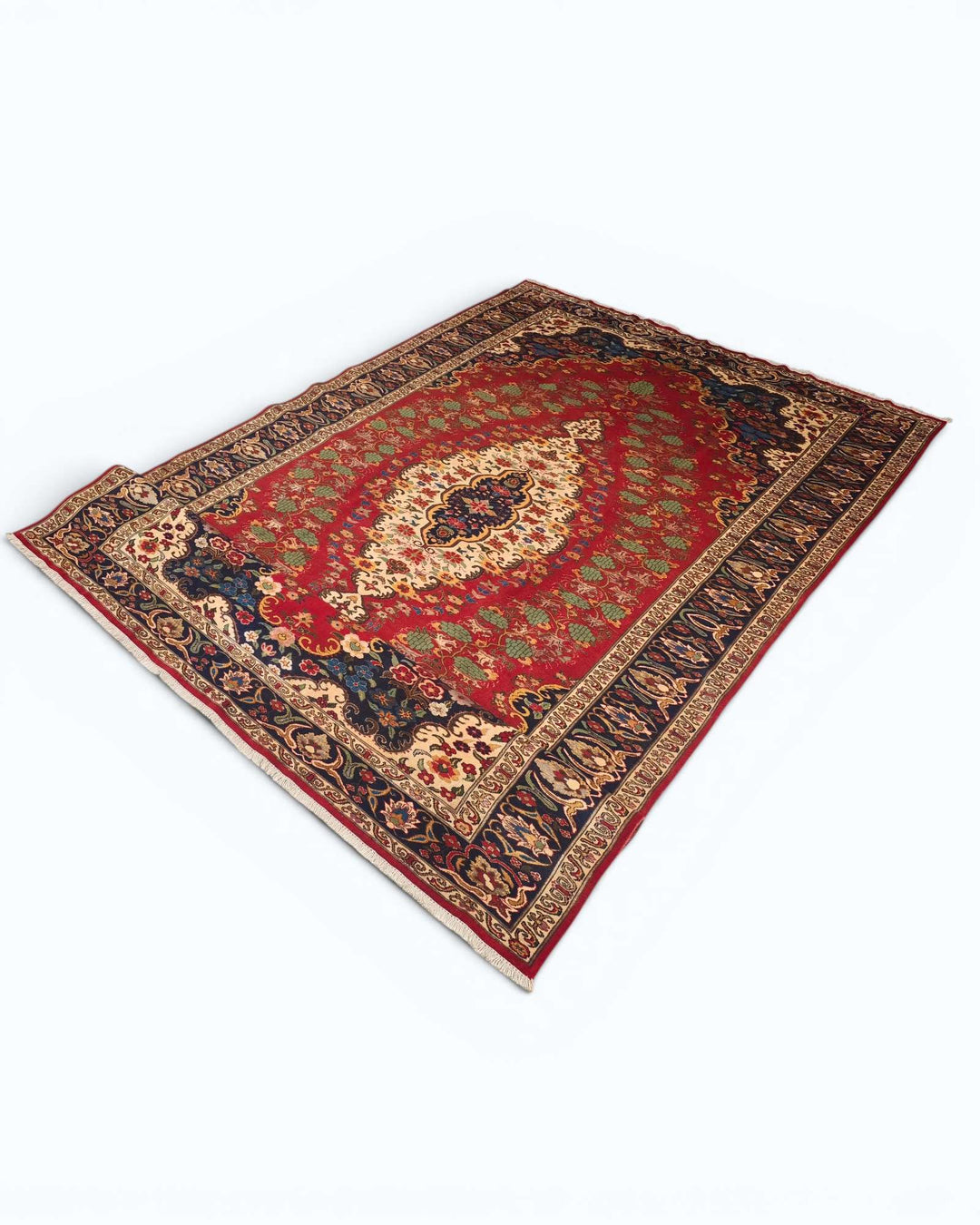 Fringe of red and navy floral medallion Afghan Sherwan rug