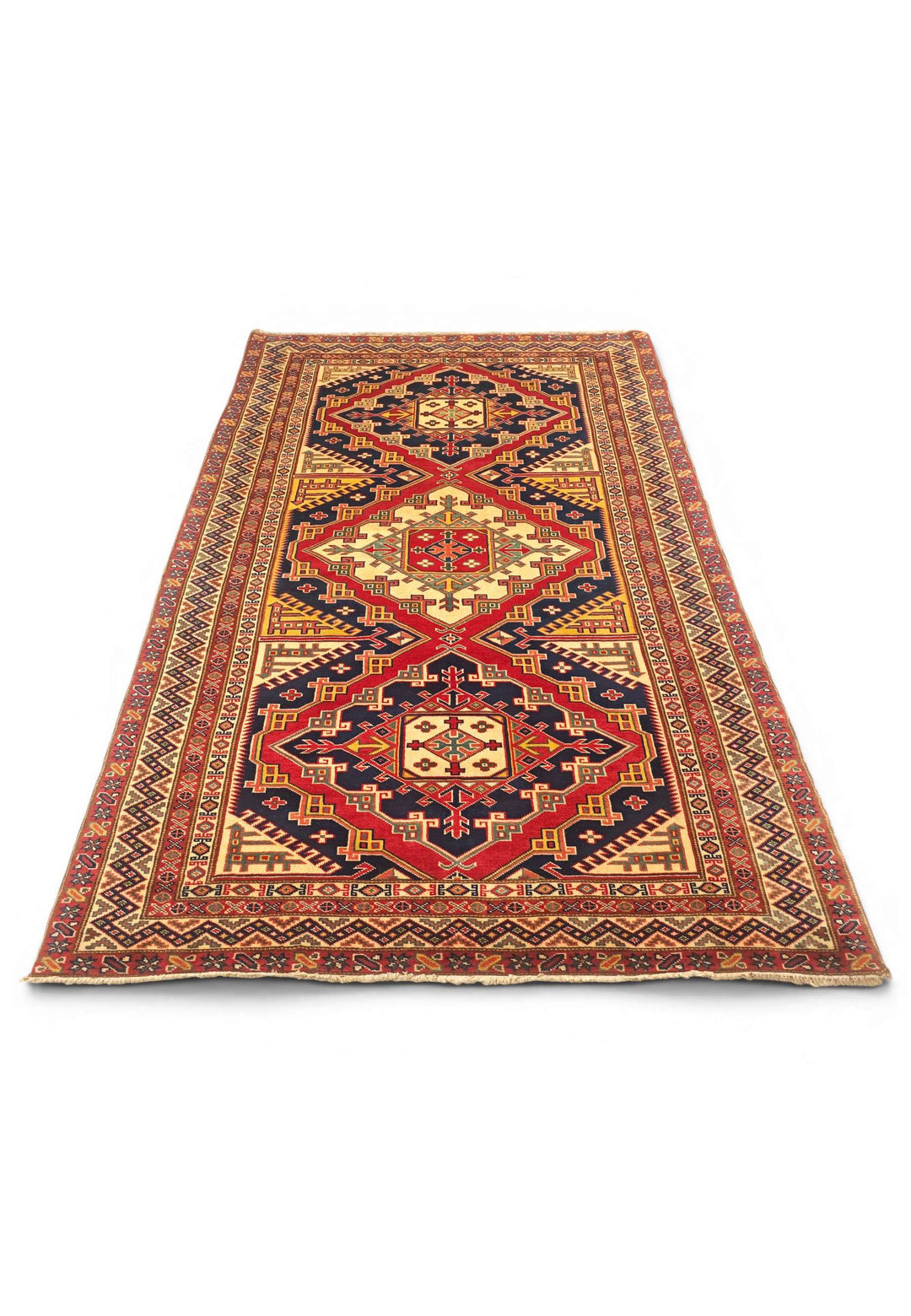 Border detail of navy and red Shirvan hand-knotted Afghan rug