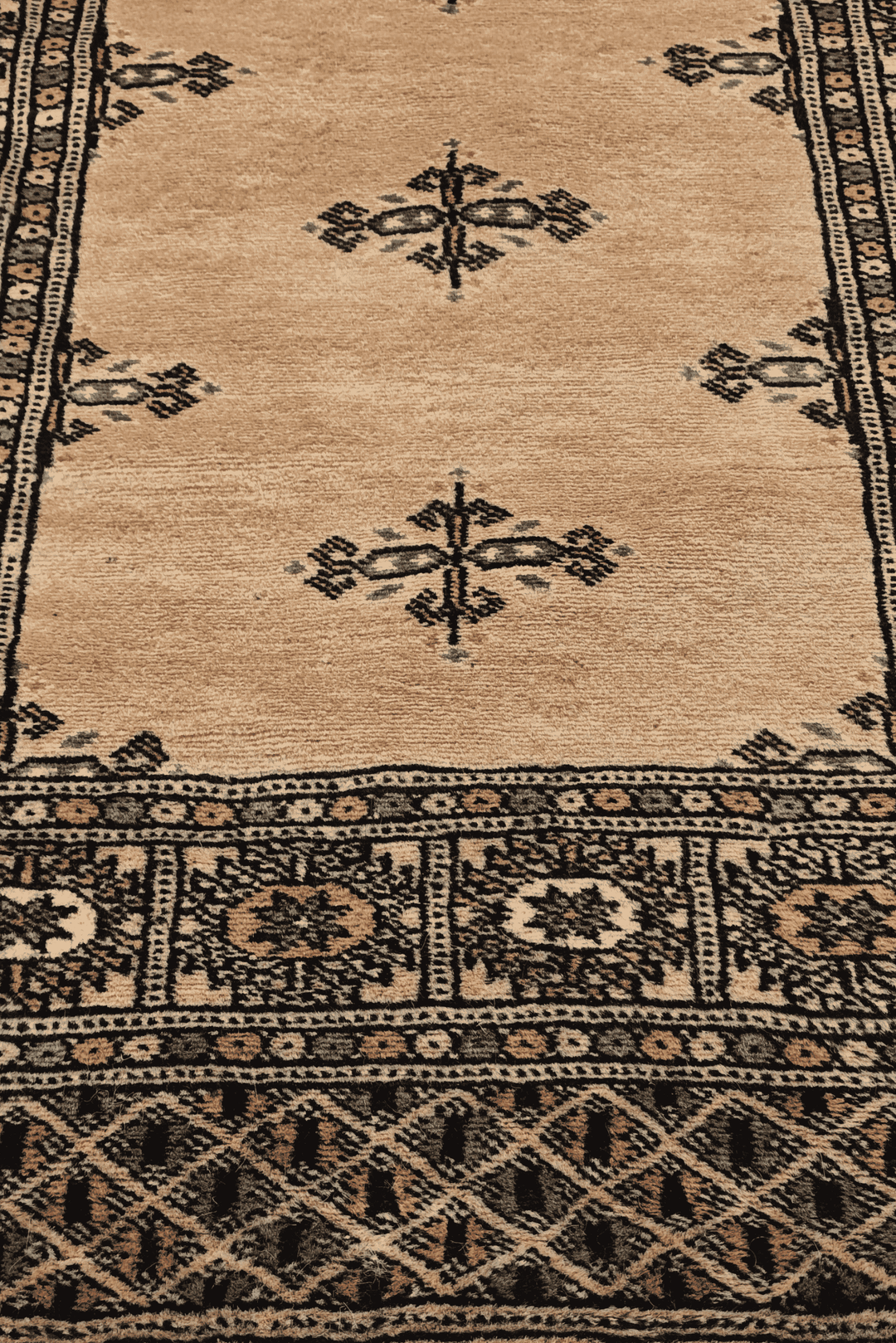 Hand-knotted camel Bokhara runner with plain open field