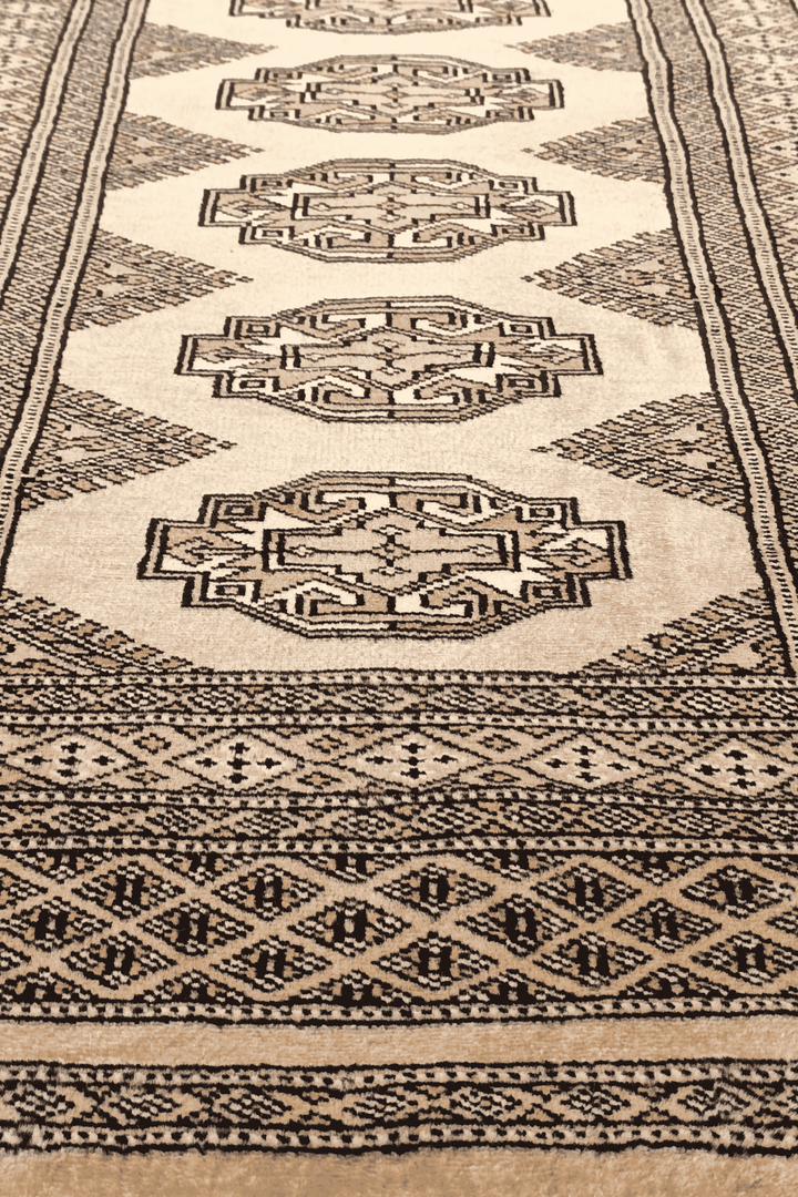 Golden tan and beige hand-knotted Yamoud wool rug, 69×156cm