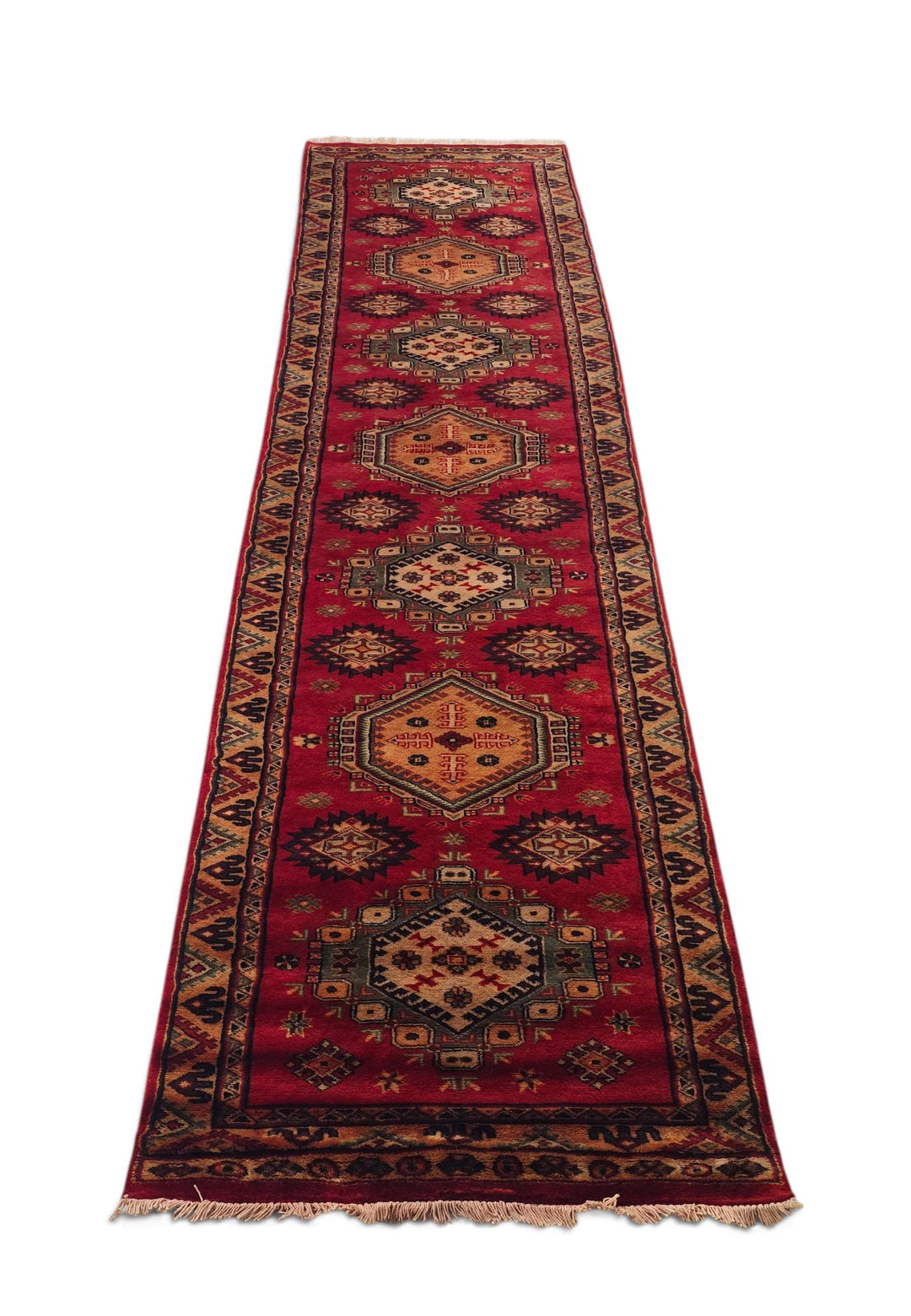 Border detail of red Kazak hand-knotted runner