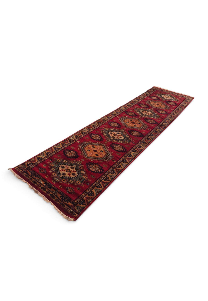 Hand-knotted wool pile of red apricot Kazak runner, 78×305cm