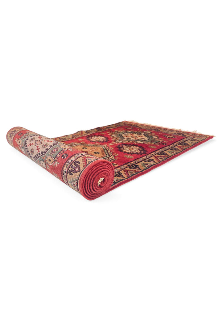 One-of-a-kind red and apricot Kazak design runner