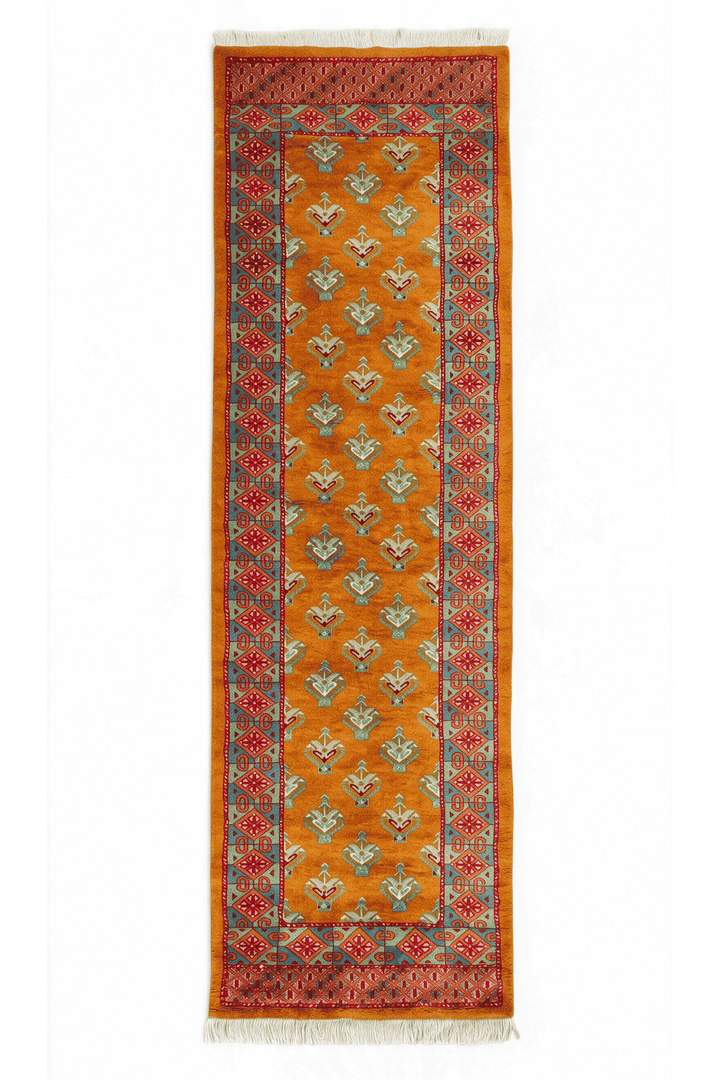 Saffron and teal flowering shrub repeat runner, 82×234cm