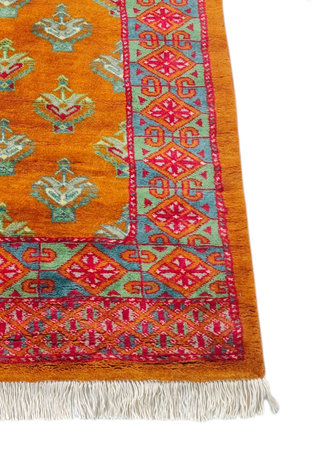 Corner of saffron and teal hand-knotted Pakistani runner