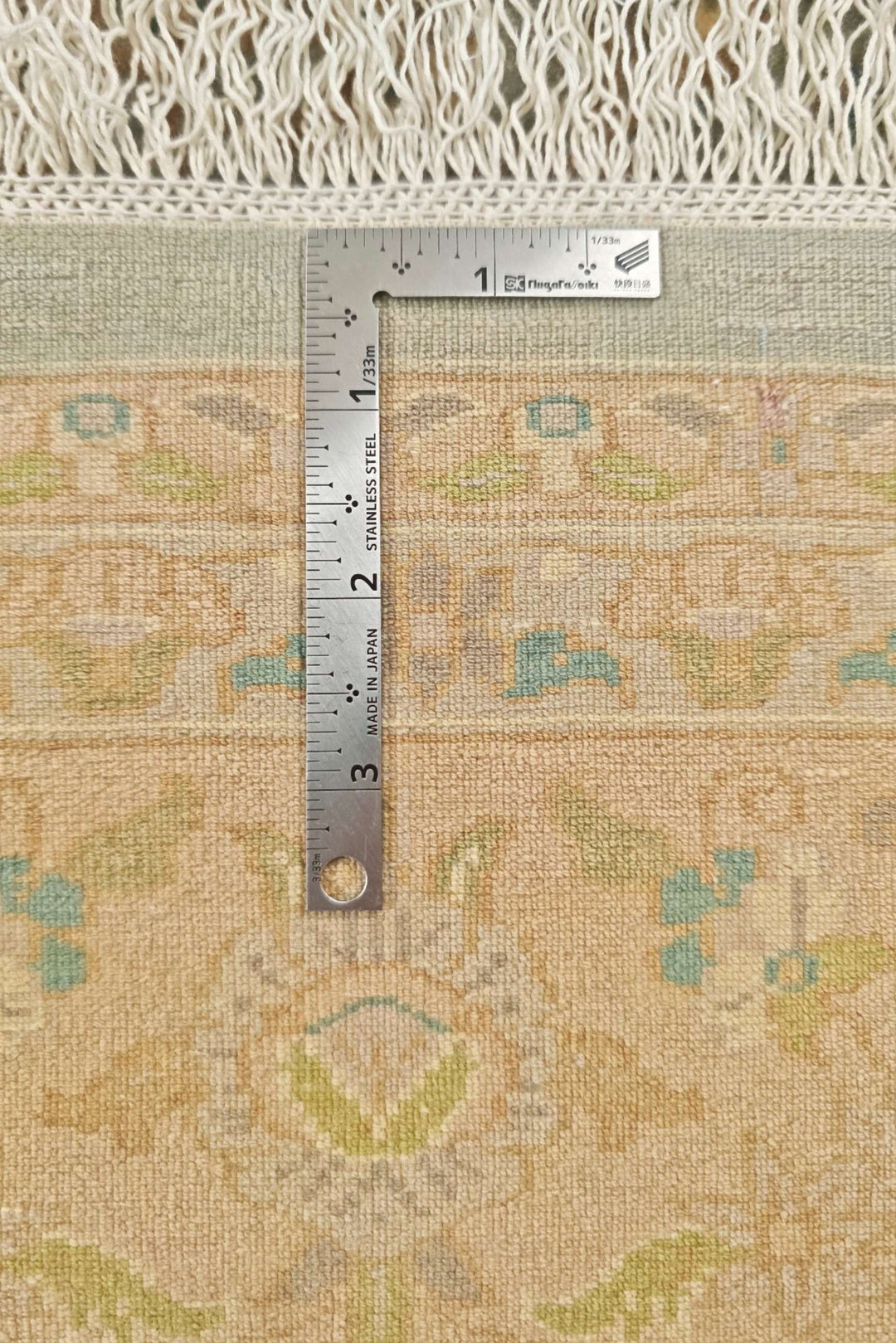 Hand-knotted sage green rug with Afshan floral, antique washed