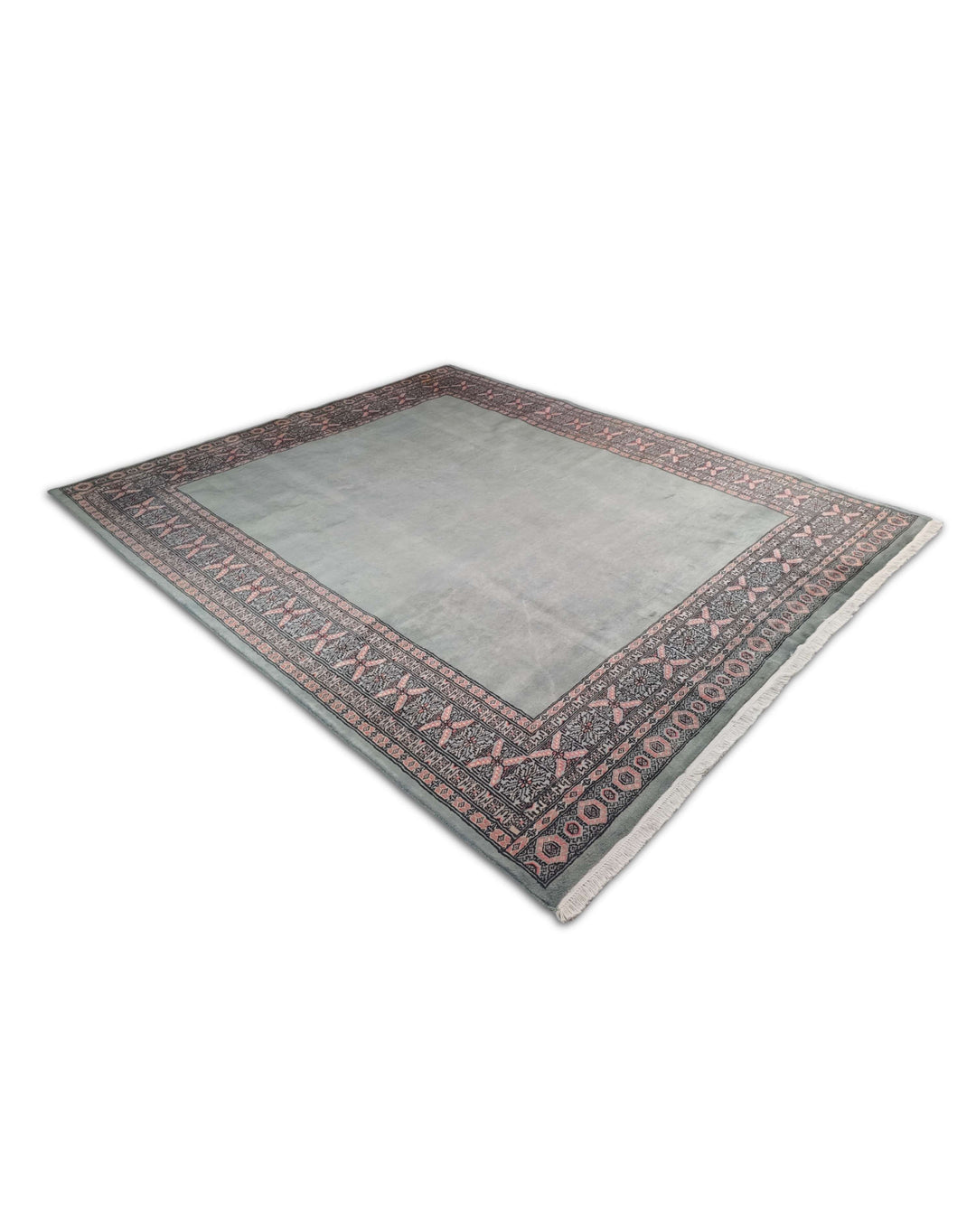 Hand-knotted sage green Bokhara rug with plain open field