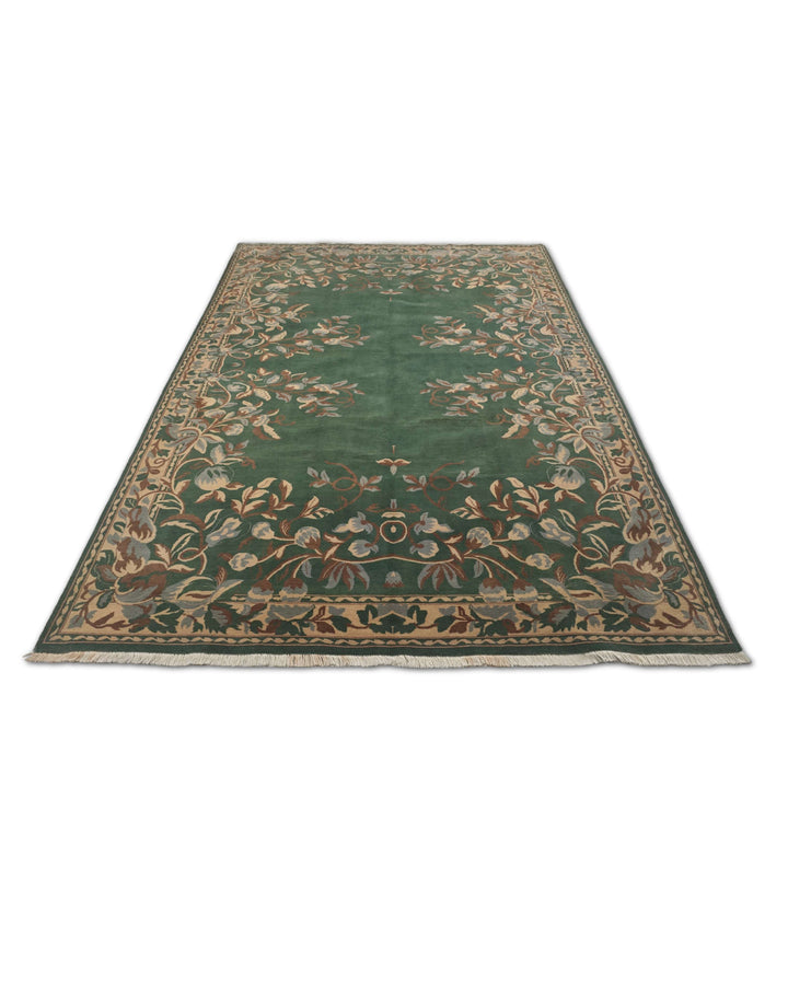 Border detail of green Gol Farang hand-knotted Pakistani rug