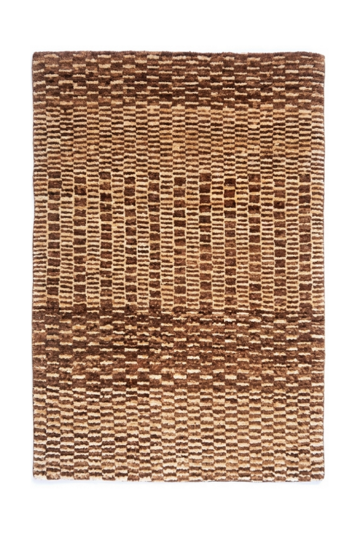 Woven brown rug with a textured pattern on a white background