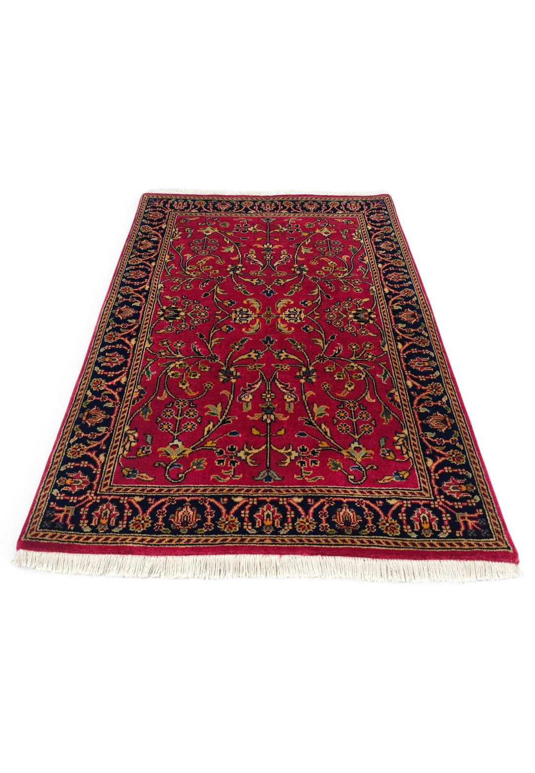 Border detail of crimson Sarouk hand-knotted Indian rug