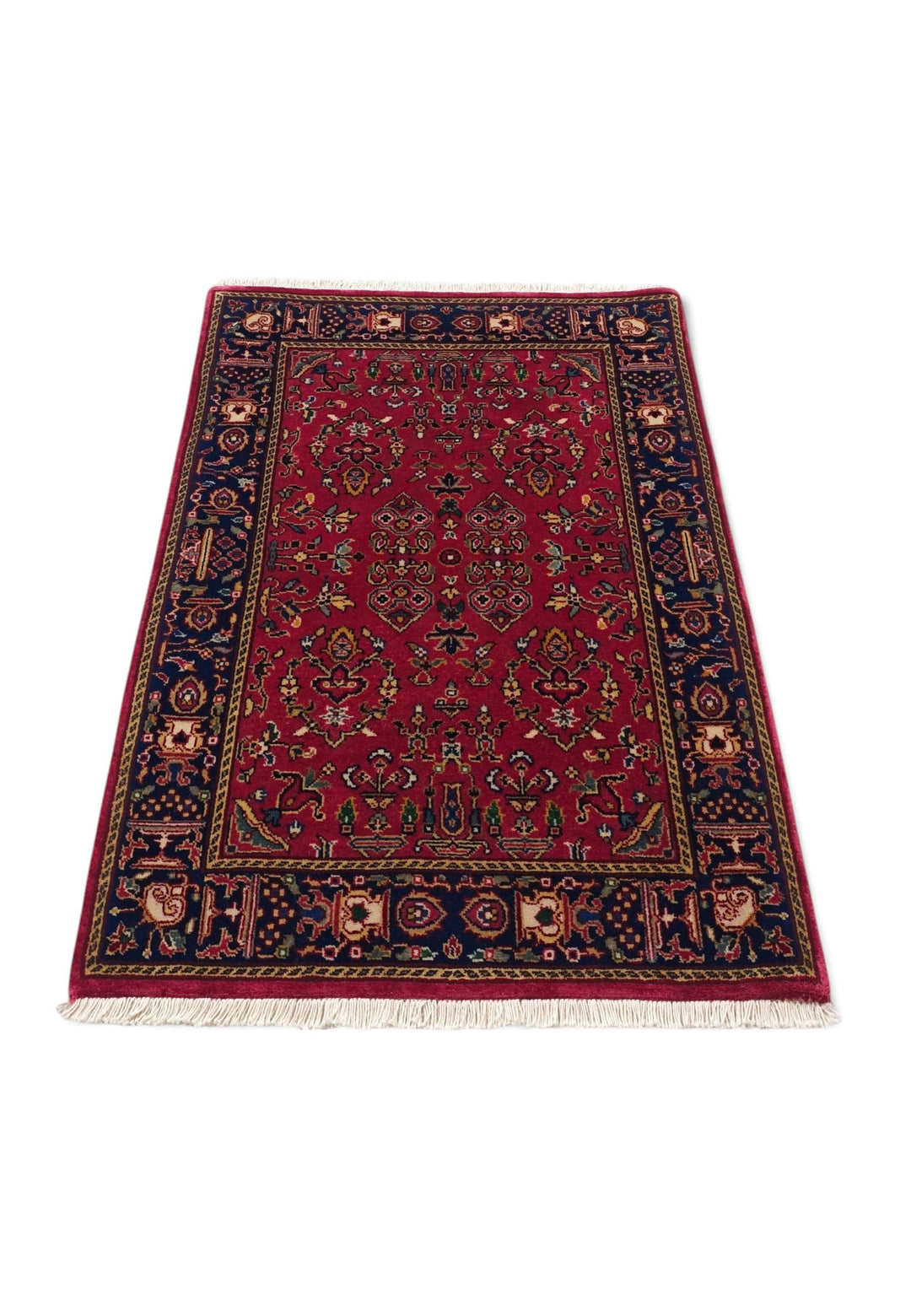Border detail of madder red Sarouk Indian rug