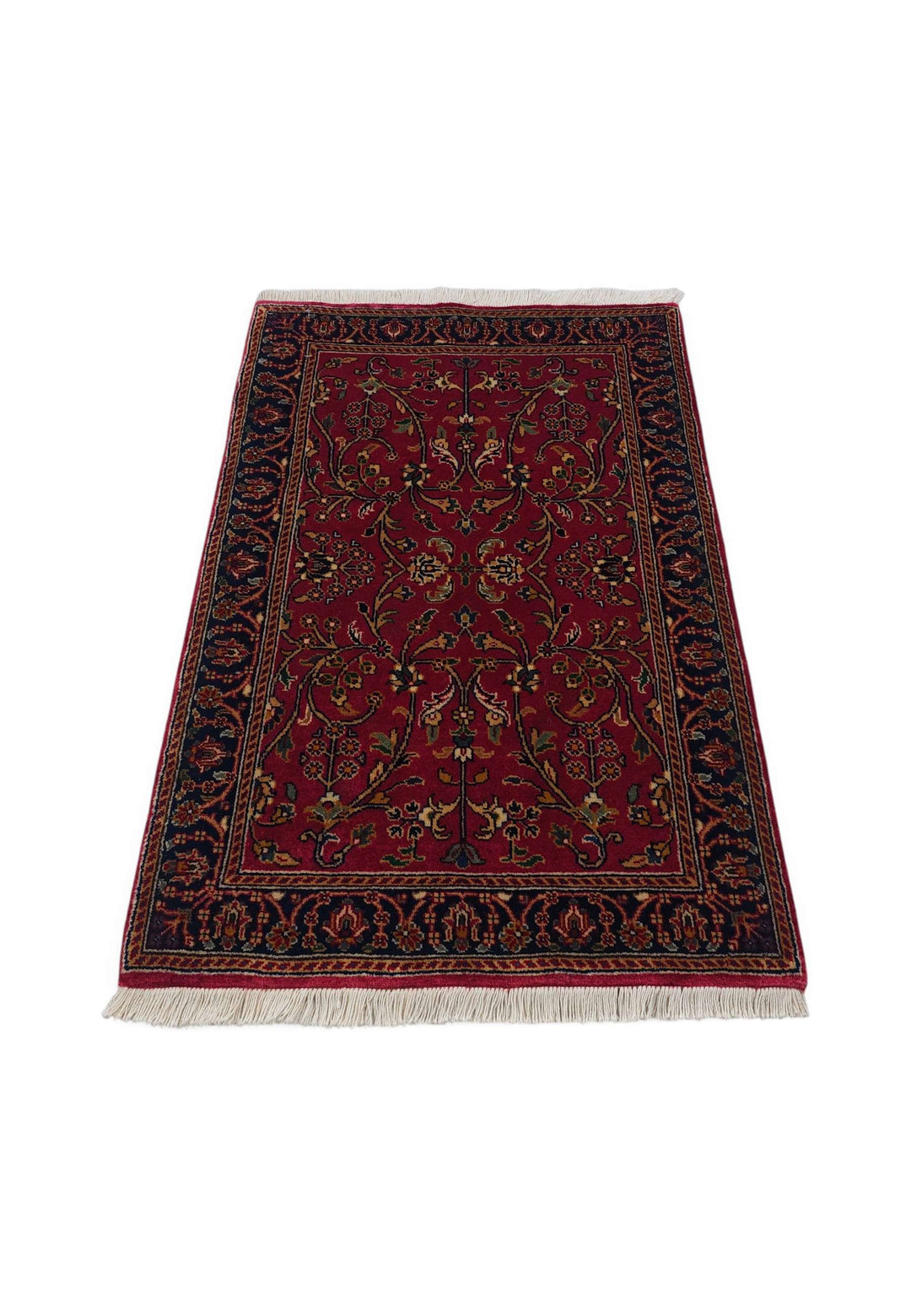 Border detail of oxblood Hereke hand-knotted Indian rug