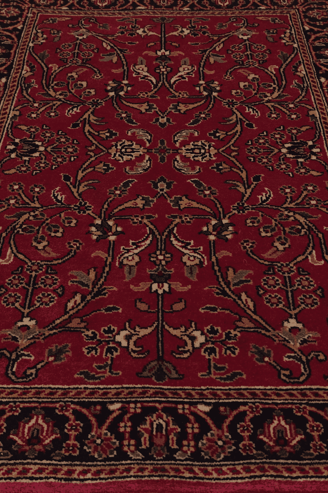 One-of-a-kind oxblood and navy Hereke Indian rug