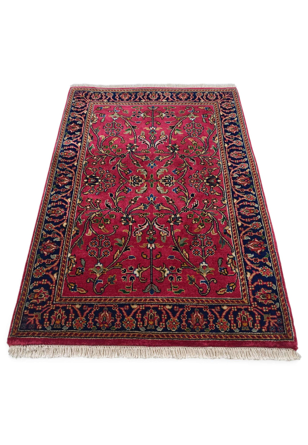 Border detail of magenta Hereke hand-knotted Indian rug