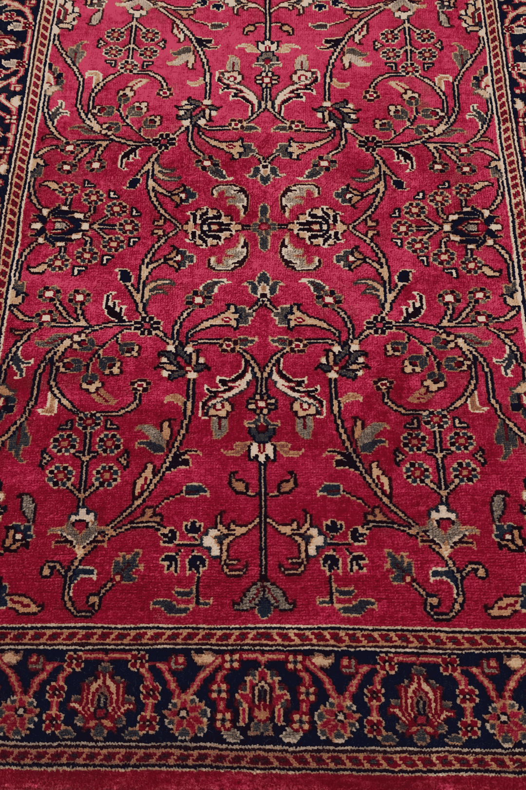 One-of-a-kind magenta and navy Hereke Indian rug
